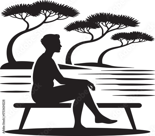 man sitting on the beach