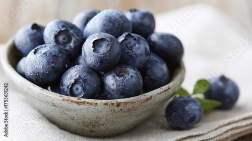 Wallpaper Mural Fresh and juicy blueberries in rustic bowl on soft textile background Torontodigital.ca