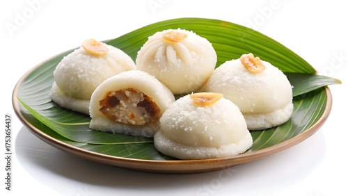Sweet Puli Pitha with Fresh Coconut Filling Traditional Dessert