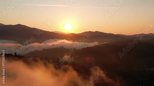 Wallpaper Mural Spectacular sunrise over mountains with low-lying clouds creating a serene landscape, inspiring nature travel. Torontodigital.ca