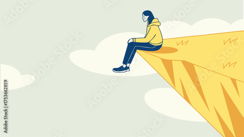 Person sitting on the edge of a cliff looking down