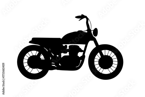 Classic Motorcycle Silhouette: A sleek, vintage motorcycle, captured in stark silhouette, exudes a timeless allure and the spirit of the open road.