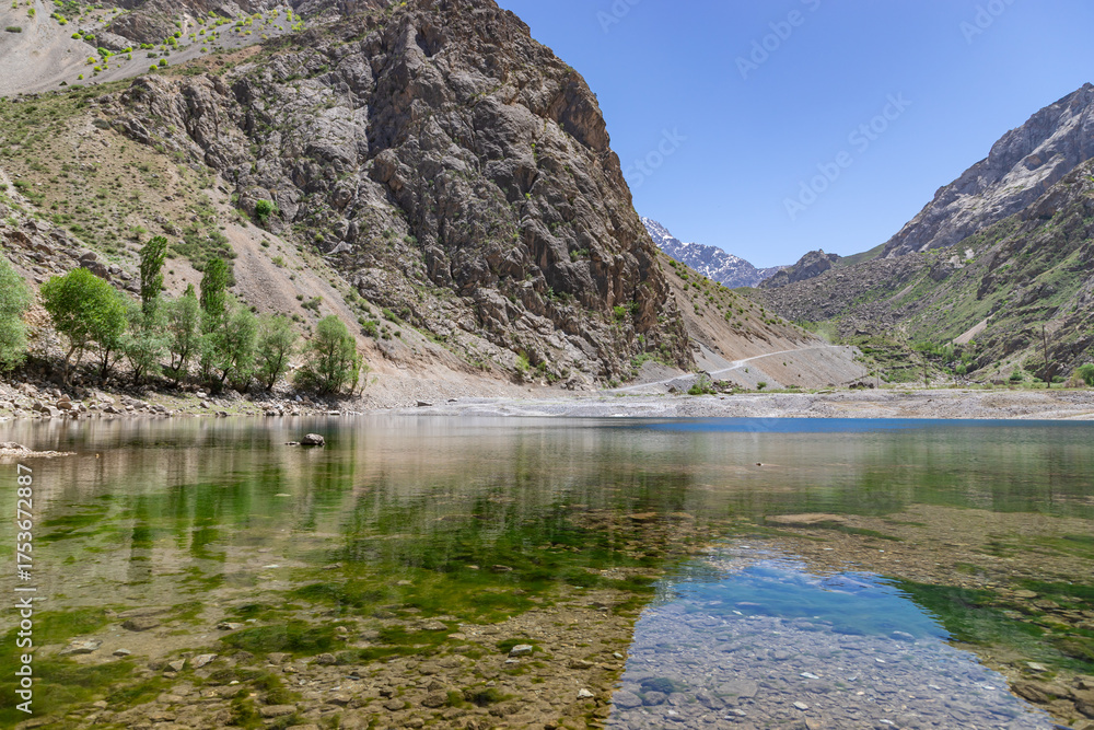 Fototapeta premium Khurdak lake is the fifth of the Seven Lakes in Fann mountains. Seven Lakes is located near Penjikent city Haft Kul, Sughd Province, Tajikistan.
