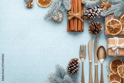 Festive Table Setting With Gifts, Pinecones, and Dried Oranges for a Winter C...