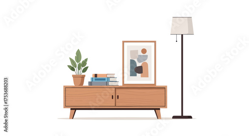 Modern wooden media console with artwork books and floor lamp.