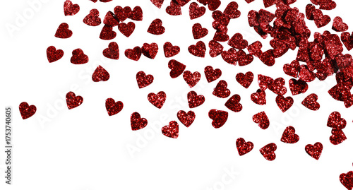 Red heart confetti falling against black background