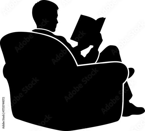 Relaxed man engrossed in reading a book while comfortably seated in a plush armchair, conveying tranquility and intellectual pursuit.