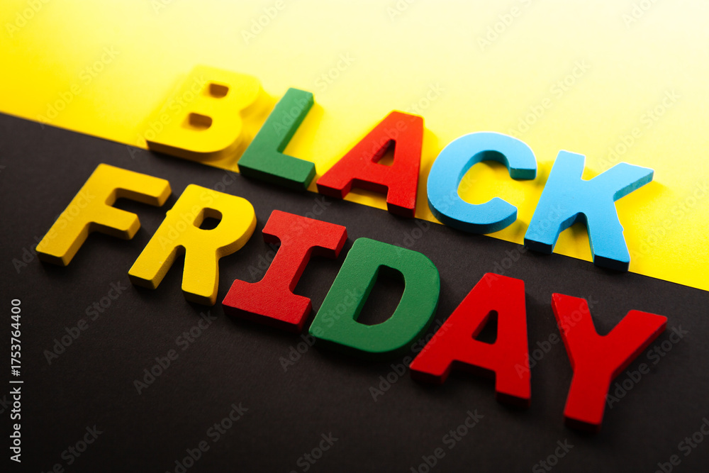 Obraz premium black friday word written on colorful cubes