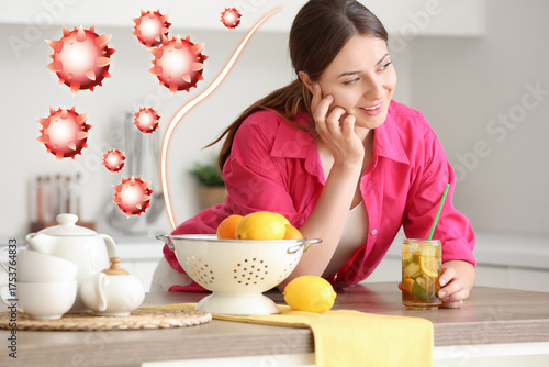 Young woman with ice tea at...