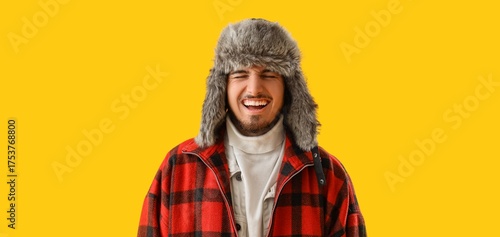 Laughing man in winter clot...