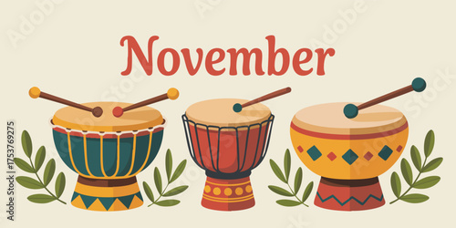 Illustration of three drums of different designs placed under the word November on a beige background with leafy accents