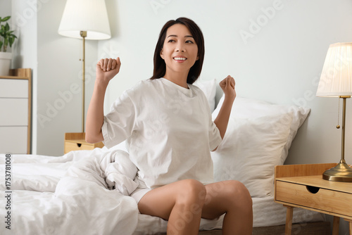 Morning of young Asian woma...