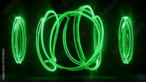 Green glowing abstract shapes on black. Circular patterns and swirling lines illuminated