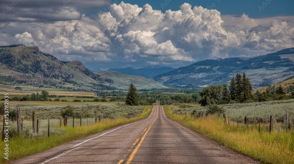 Obraz premium Scenic Open Road with Lush Greenery and Dramatic Clouds in a Beautiful Mountain Landscape