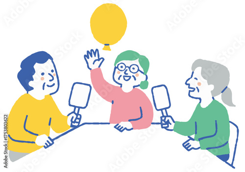 Elderly men and women playing with balloons_color