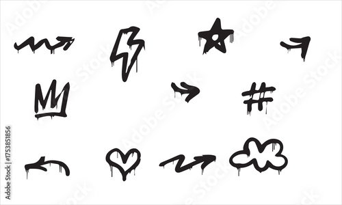 Graffiti doodles of skull lightning bolt heart crown and star symbols