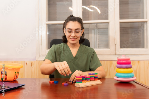 Speech therapist using interactive toys for patients.