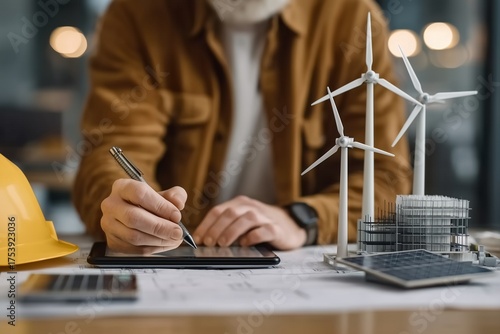 Engineer Designs Sustainable Energy Solutions with Digital Tools and Model Wind Turbines