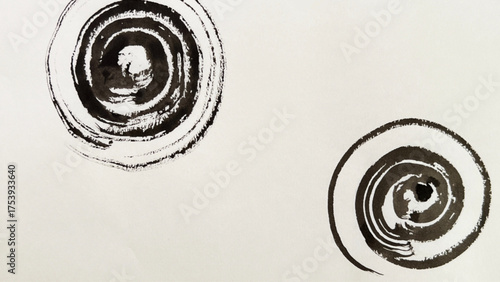 Ink-drawn water ripples, ripples painted with ink and brush, ink wash painting of ripples, round swirl