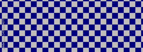 WCheckerboard banner. Navy and Beige colors of checkerboard. Small squares, small cells. Chessboard, checkerboard texture. Squares pattern. Background. Repeatable texture. Eps10