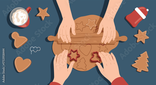 Family baking holiday cookies together with festive cookie cutters on a dark blue surface.