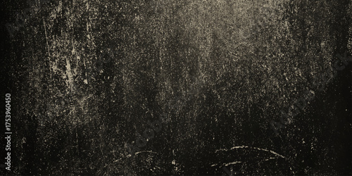 Monochromatic wall texture in black and warm tones with vignette effect.
