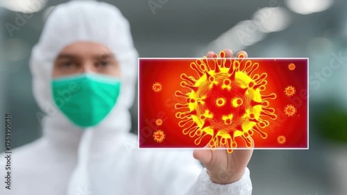 Scientist in Protective Gear Holding Image of Virus with Bright Background in Laboratory Environment