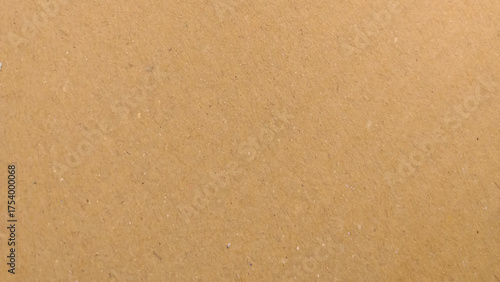 Abstract brown recycled paper background. Simple plain brown background, minimal brown wallpaper paper texture.
