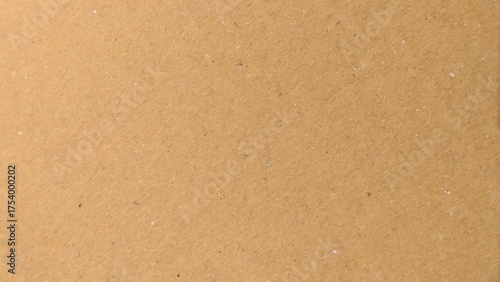 Abstract brown recycled paper background. Old Kraft paper texture box craft stripes pattern.
top view.
