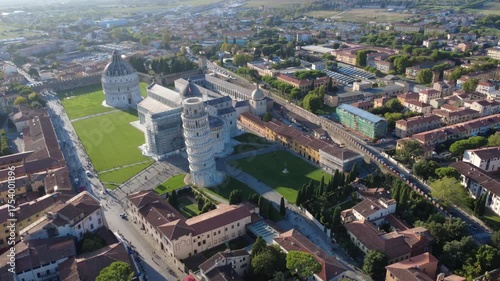 Pisa, Italy - September 05, 2025: the majestic architecture of Pisa’s historical Square of Miracles at sunset