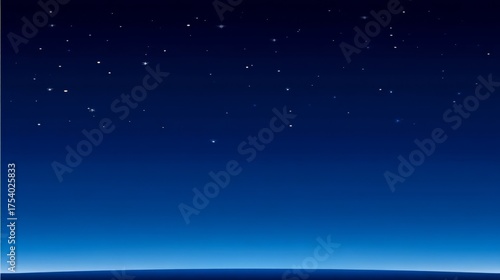 A tranquil night sky with a clear horizon, scattered white stars, and a gradient from deep blue to lighter hues,