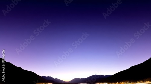 Serene evening landscape with twilight sky transitioning from deep blue to lavender, mountain range silhouette,