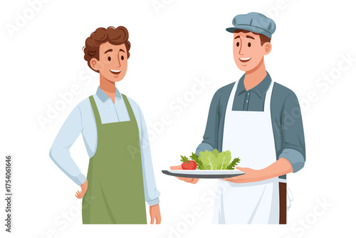 Two smiling men in aprons one holding a plate of fresh produce
