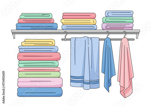 Neatly folded and hung towels in a closet space.