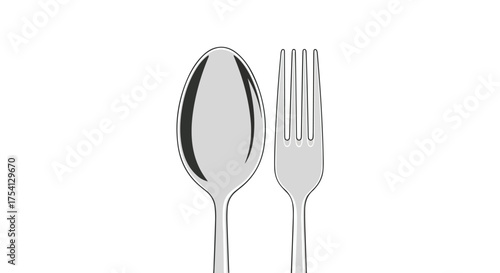 Elegant monochrome cutlery composition featuring a spoon and fork set against a pristine white backdrop evoking simplicity and modernity