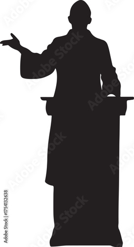 Silhouette of a person in academic robes speaking at a podium