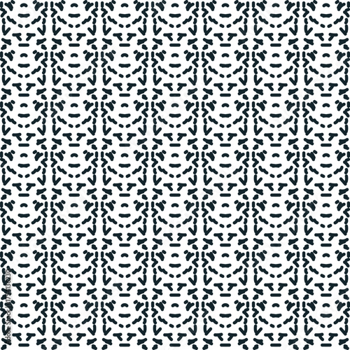 Small short lines form a symmetrical pattern.