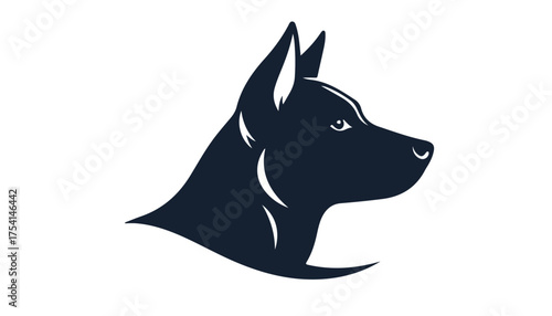 A stylized, dark silhouette profile of a dog's head, featuring pointed ears and a focused gaze.