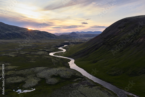 Winding river in stíflisdalur valley at sunset iceland