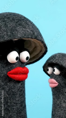 Two creative felt mushroom characters with funny faces. Handmade crafts. Textile art. Abstract animation footage.