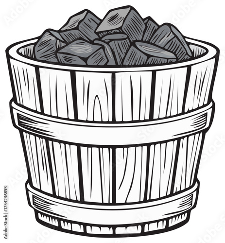 Traditional wooden bucket with hot sauna rocks for steam bath relaxation
