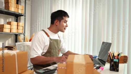 An online store owner preparing product packages for delivery, representing the growing e-commerce trend, small business management, and efficiency in online retail logistics.