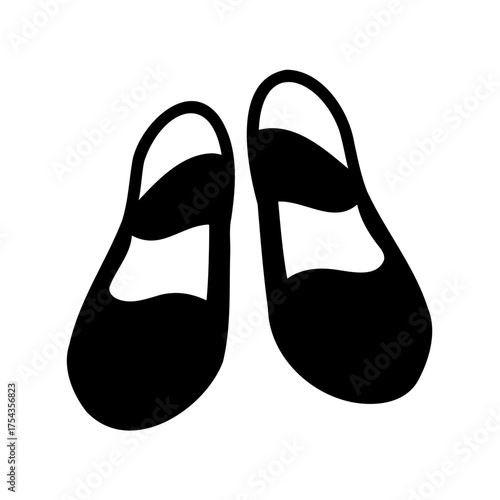 Black silhouette of a pair of Mary Jane shoes isolated on white