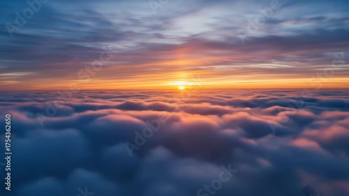 Vast Ocean Of Clouds At Sunset With Golden Sunrays And Pink Hues