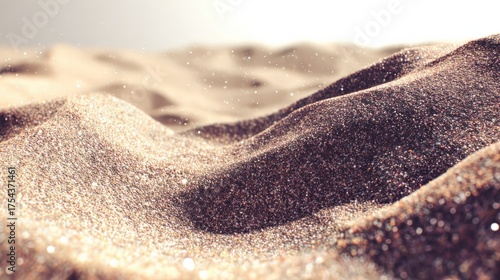 Fototapeta Naklejka Na Ścianę i Meble -  Close up view of textured sand dunes with shimmering particles under soft lighting