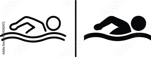 Two swimmers in water distinct styles displayed as a dark silhouette.