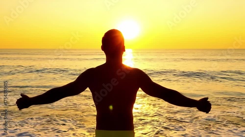 Embracing the sunrise on a peaceful beach in golden hues of morning light
