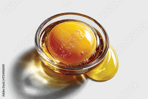 Egg yolk in a glass bowl close-up shot of raw egg ingredient for cooking and baking recipes