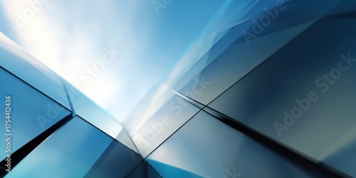 Modern Corporate Glass Building Facade Reflected in Bright Blue Sky