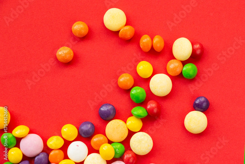 Candy on the red background